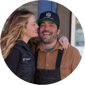 Daniel Gale in an Adaptive Action Sports cap with Amy Purdy